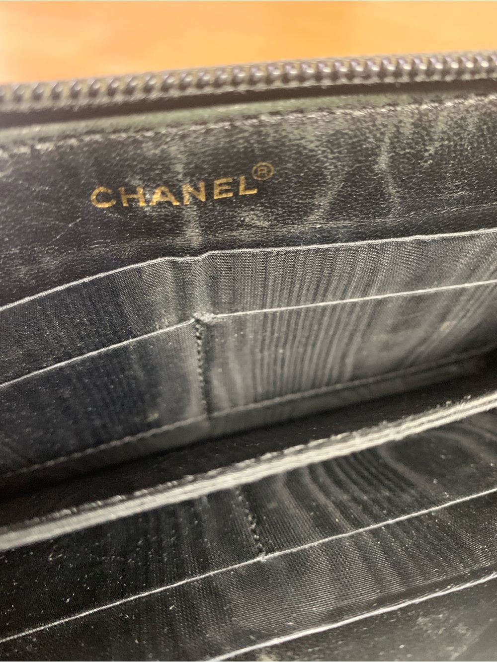 CHANEL Black Pebbled Leather Zip Wallet with Gold Pull - Picture 8 of 17
